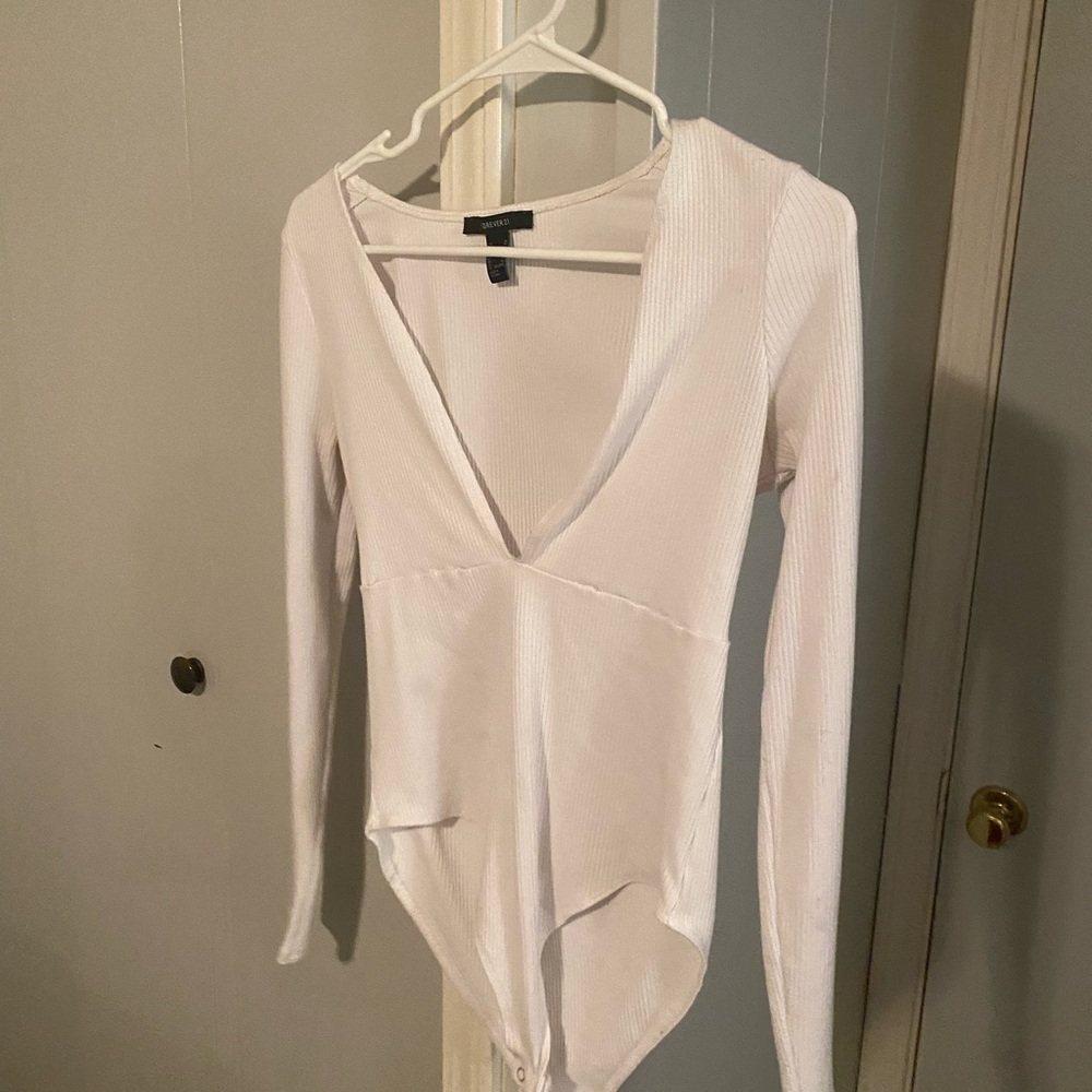 Deep cut long sleeve bodysuit